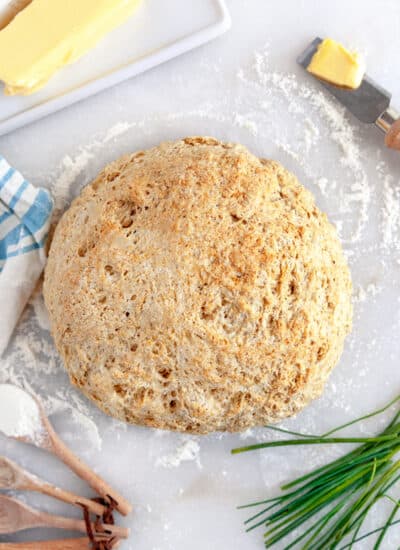 Bonnach bread shot overhead with butter.