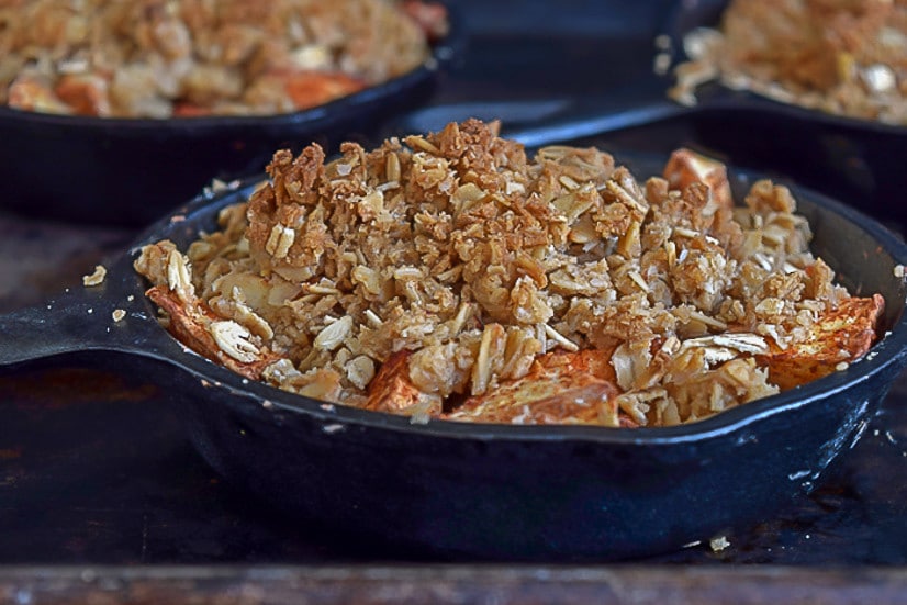 A recipe for individual apple crumbles. A healthy & easy dessert made in individual ramekins or mini cast iron skillets, but can be made in a baking dish.