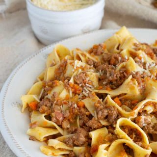 A plate of pappardelle with ragu alla bolognese.