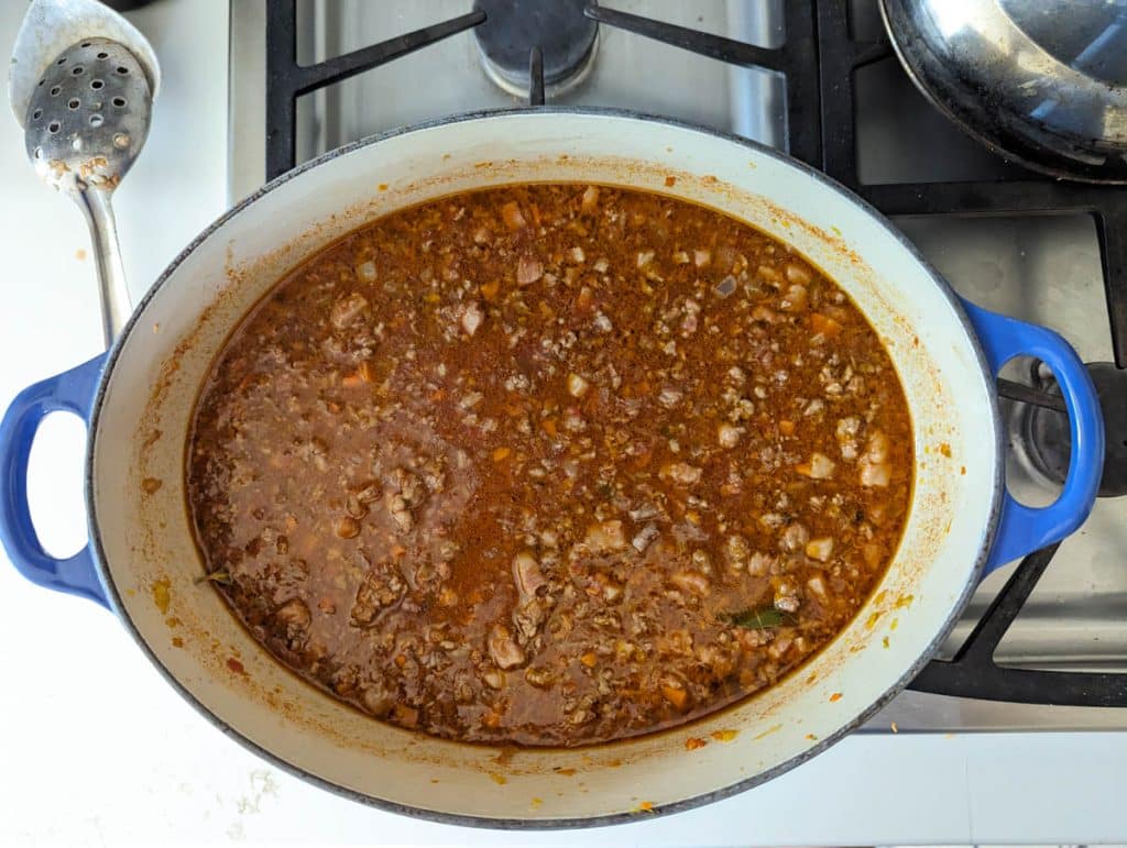 Pot of Bolognese sauce ready to simmer.