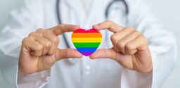 LGBT pride month or LGBTQ+ or LGBTQIA+ and health concept. Doctor with rainbow and colorful heart shape with for Lesbian, Gay, Bisexual, Transgender, Queer and Pansexual community