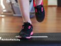 woman participating in step exercise