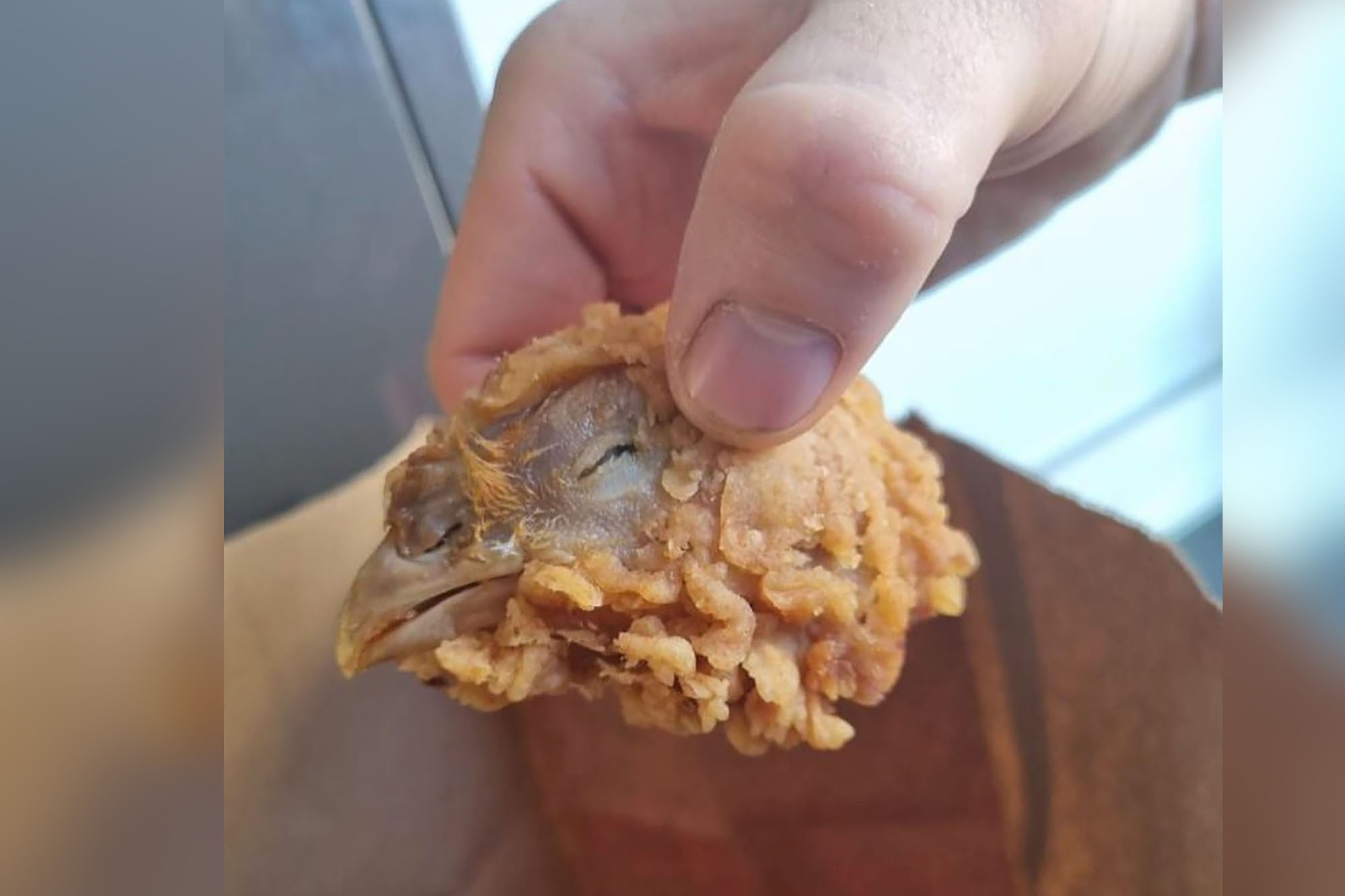 Diner Disgusted After Finding A Full Chicken Head In Her Box Of Kfc Hot  Wings