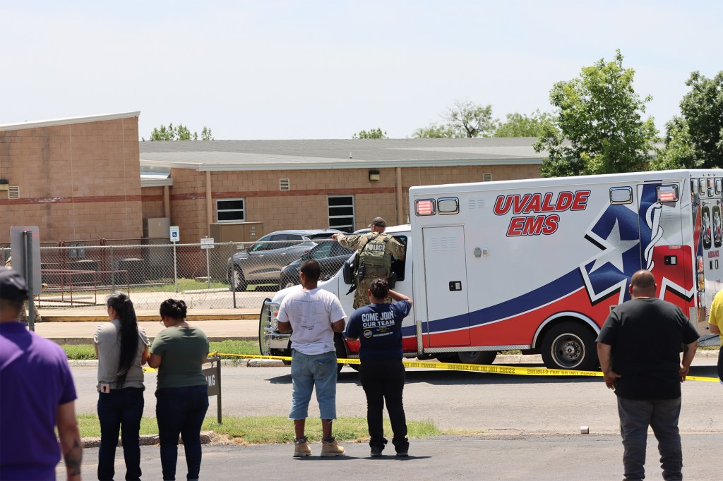 Police and other enforcement agenices rescue terrified students through windows during Texas school massacre - Robb Elementary School in Uvalde, Texas, U.S. May 24, 2022.