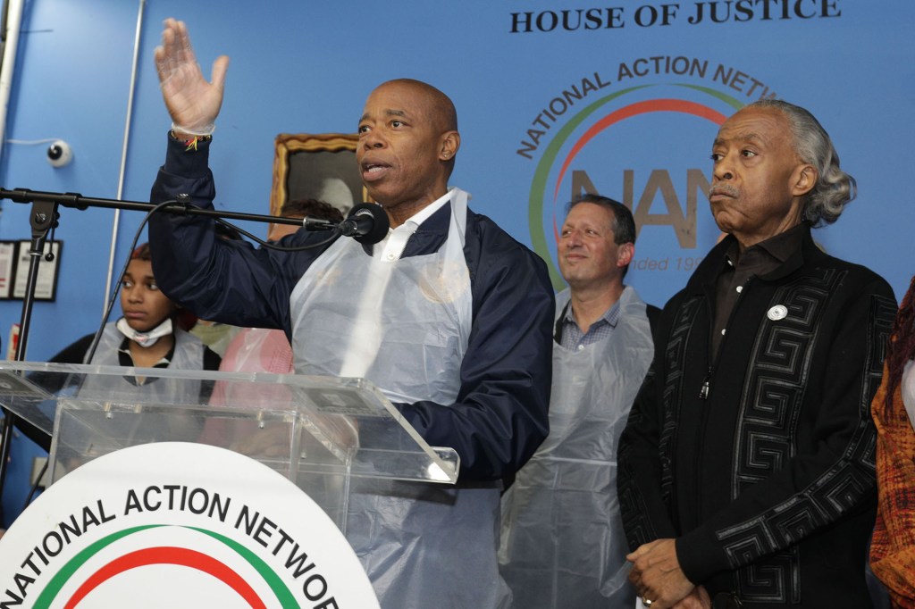 Eric Adams speaks to a crowd at the National Actions Network headquarters in Harlem. 