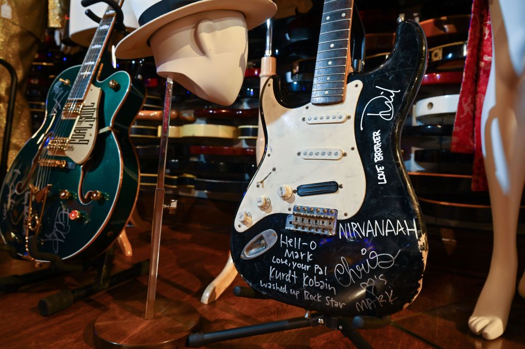 The guitar was smashed while Nirvana were recording their "Nevermind" album in the early 1990s, and it was later reassembled. 