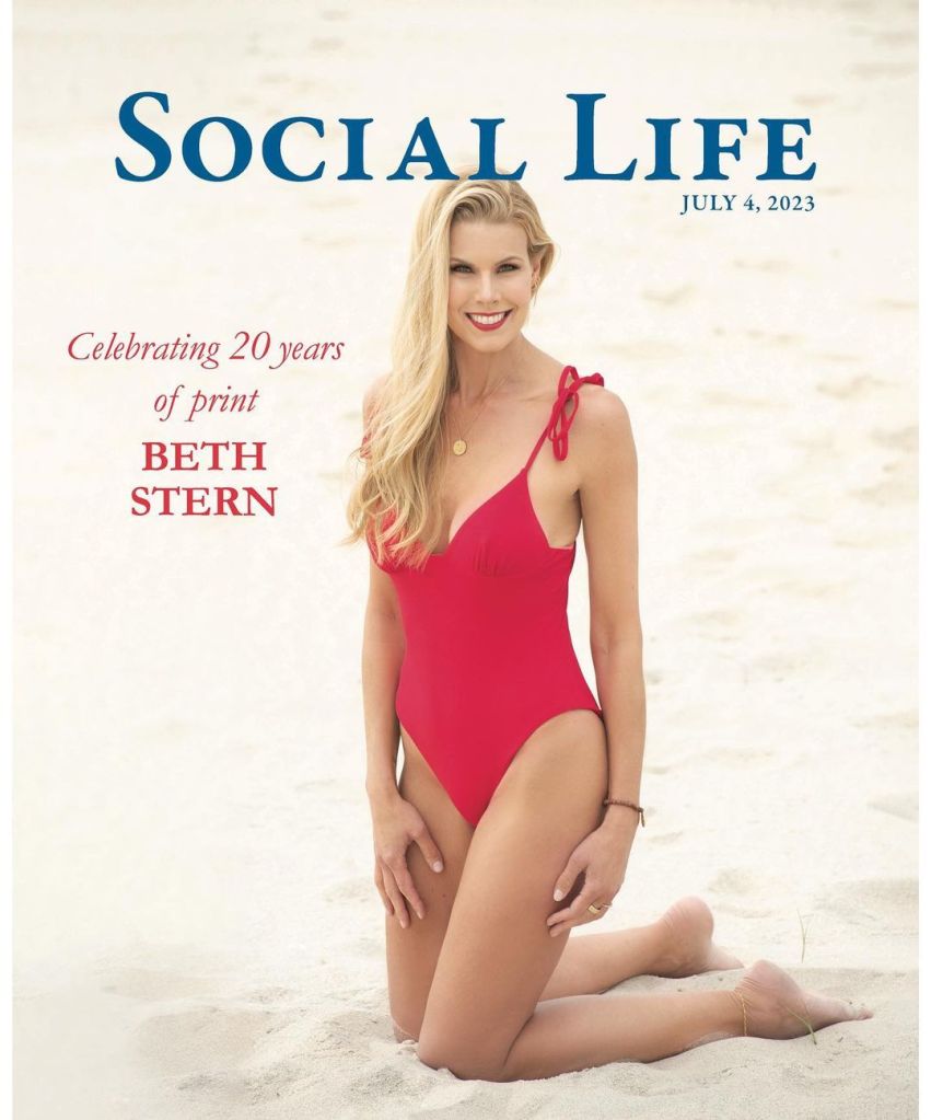 Beth Stern in red one piece on cover of magazine