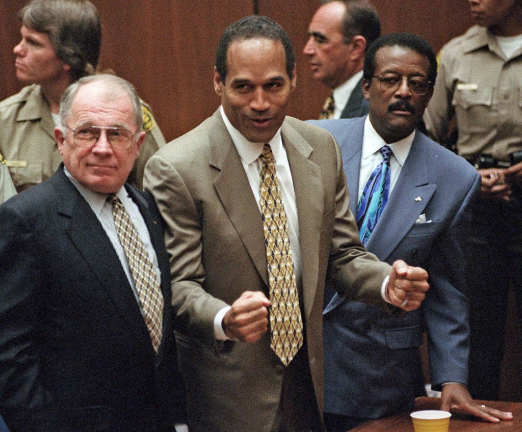 Simpson and his lawyers reacting after he was found not guilty.