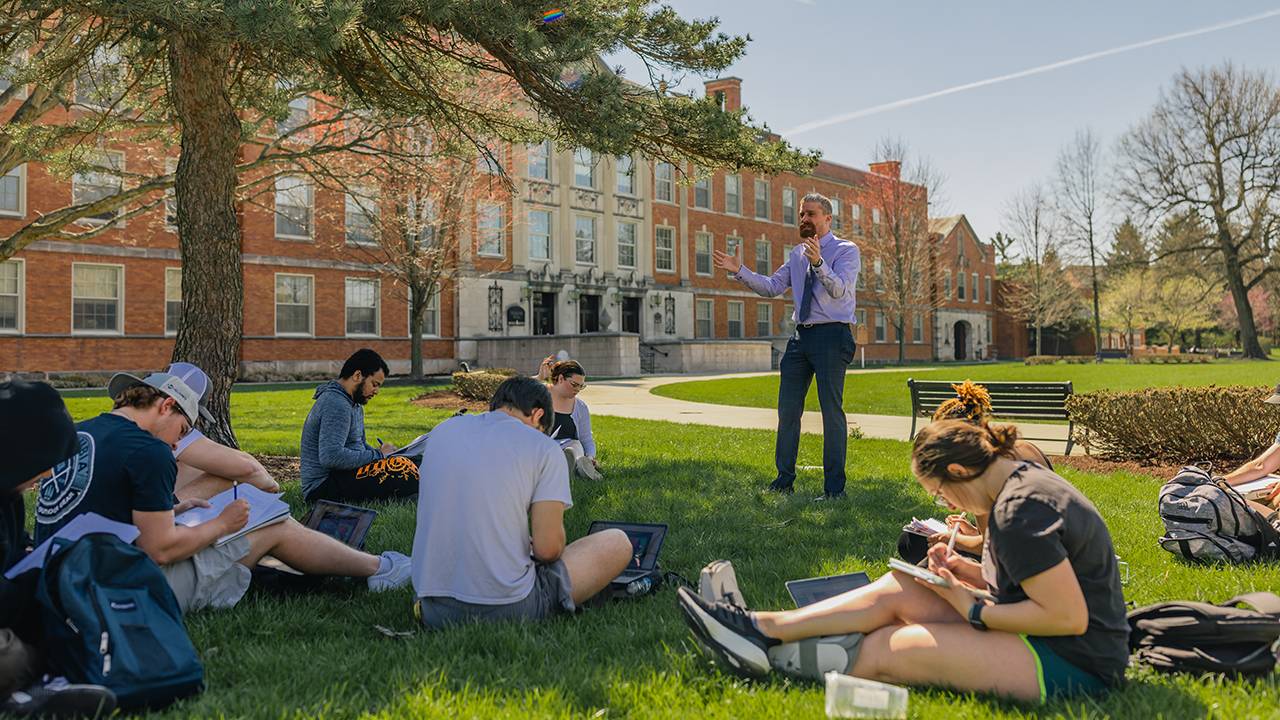 ODU students in class outside on the Erskine Oval