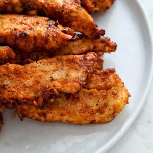 Plate of blackened chicken.