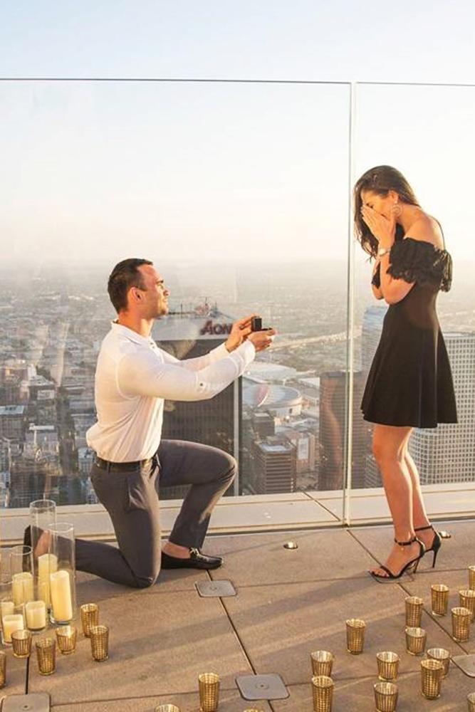 marriage proposal at the roof candle romantic