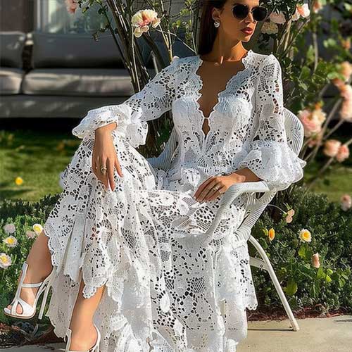 A beautiful girl in a white lace dress