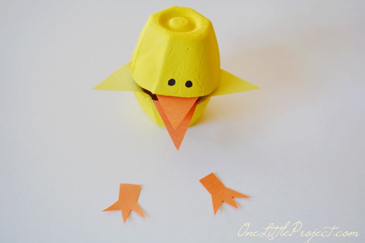 These fun little candy filled Easter egg carton chicks are a super cute Easter craft idea for kids.