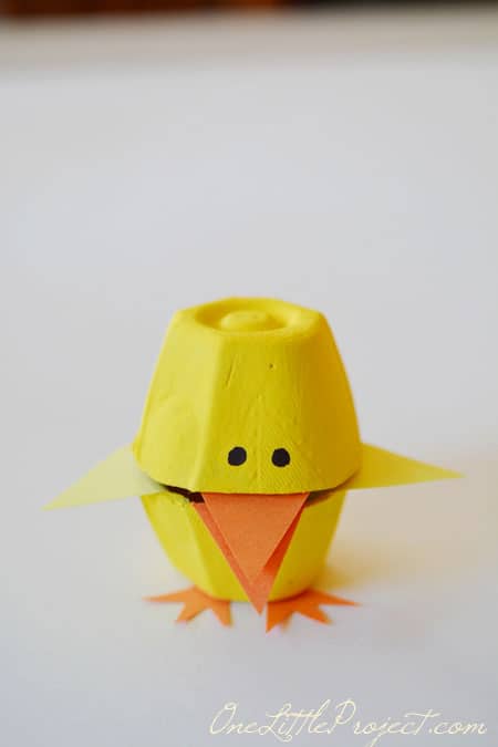 These fun little candy filled Easter egg carton chicks are a super cute Easter craft idea for kids.