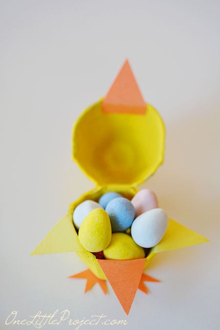 These fun little candy filled Easter egg carton chicks are a super cute Easter craft idea for kids.