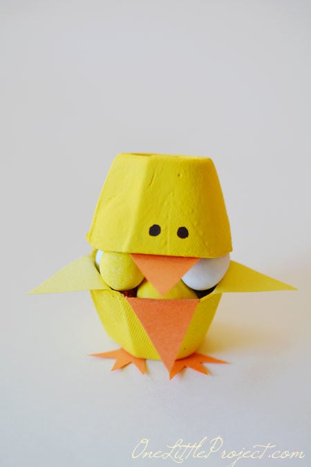 These fun little candy filled Easter egg carton chicks are a super cute Easter craft idea for kids.