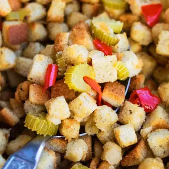 Easy One Pot Turkey Stuffing or Dressing in Large Spoon- Closeup Shot.