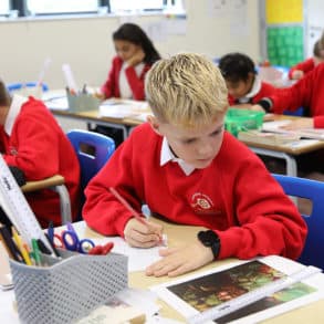 f Year 6 children working in Brading C of E Primary School