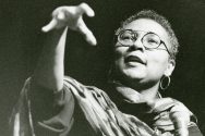 Black and white photo of bell hooks giving a lecture