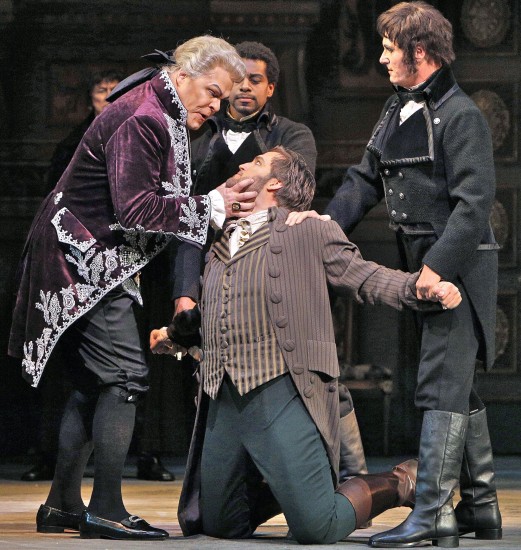 Scarpia, ruthless and sadistic, with Cavaradossi and Spoleto (Joel Sorenson)