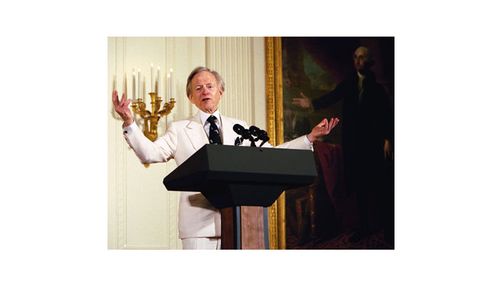 tom wolfe in his iconic white suit, literary fashion