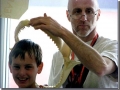 School Principal Bill McCoster displaying the program's Bull Shark Jaw in Grand Rapids, MI