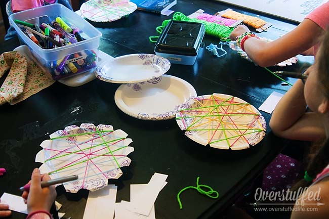 Charlotte's Web Book Club Craft: Paper Plate and Yarn spider webs