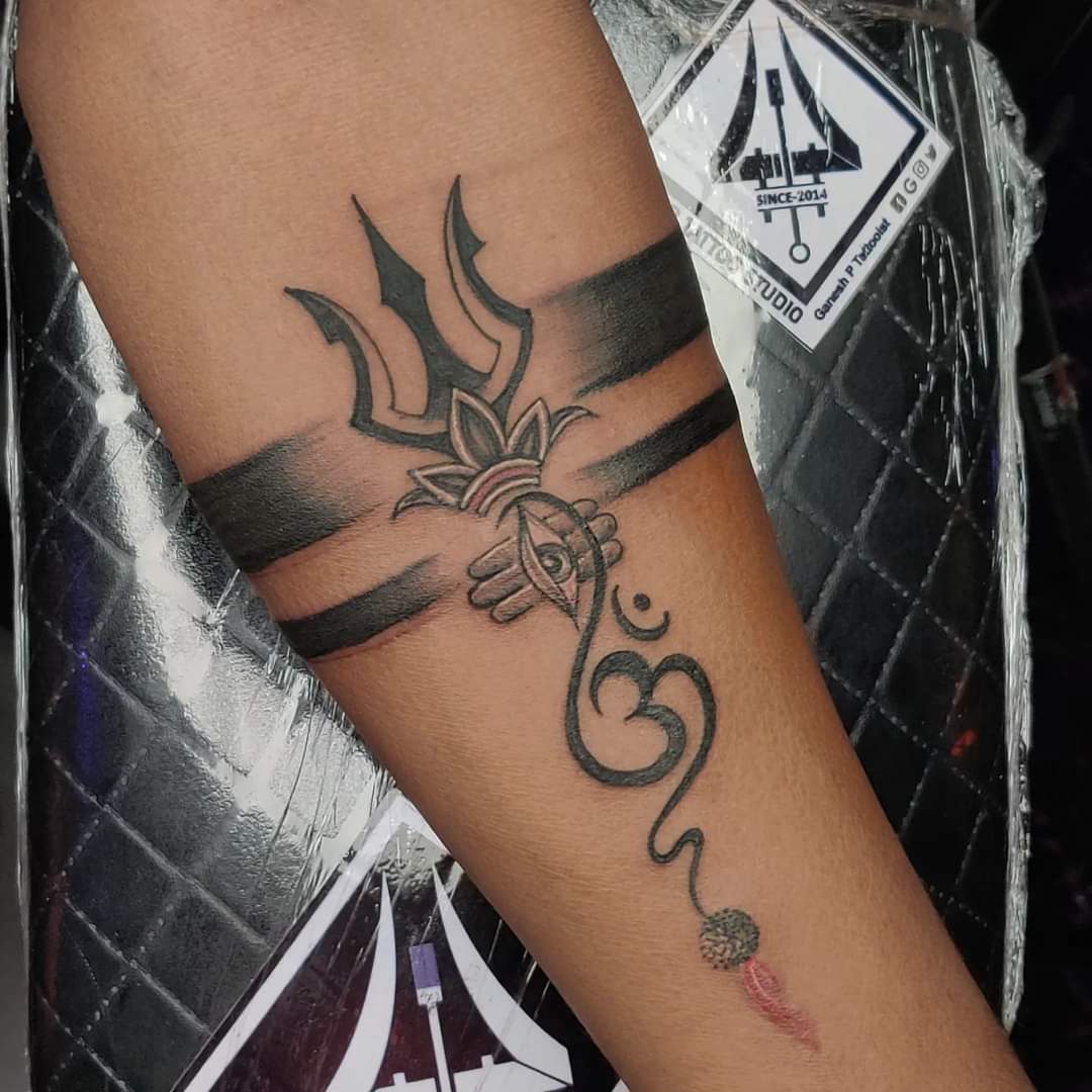 Ordershock Lord Shiva with Trishul Tribal Hand Band Temporary Body Tattoo   Price in India Buy Ordershock Lord Shiva with Trishul Tribal Hand Band  Temporary Body Tattoo Online In India Reviews Ratings