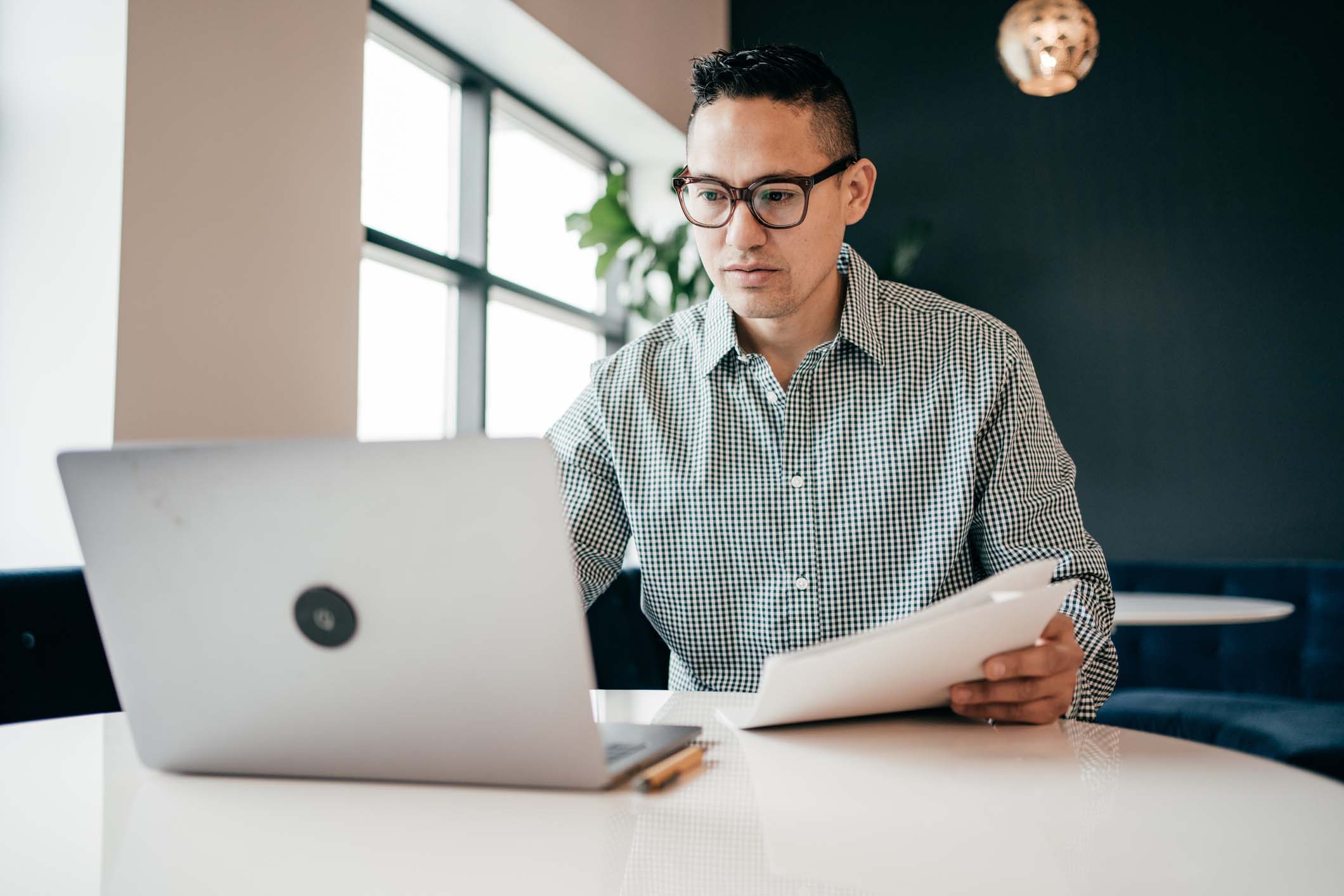 man looking at computer