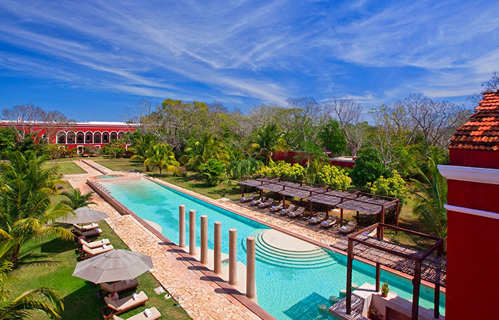 Dusk romantic dinner setting for two at Hacienda Temozon, A Luxury Collection Hotel in Yucatan, Mexico.