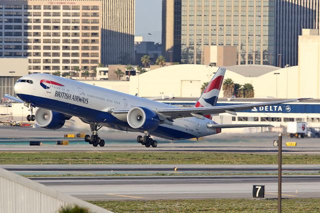 BOEING 777-300ER (G-STBD) - Takes off.