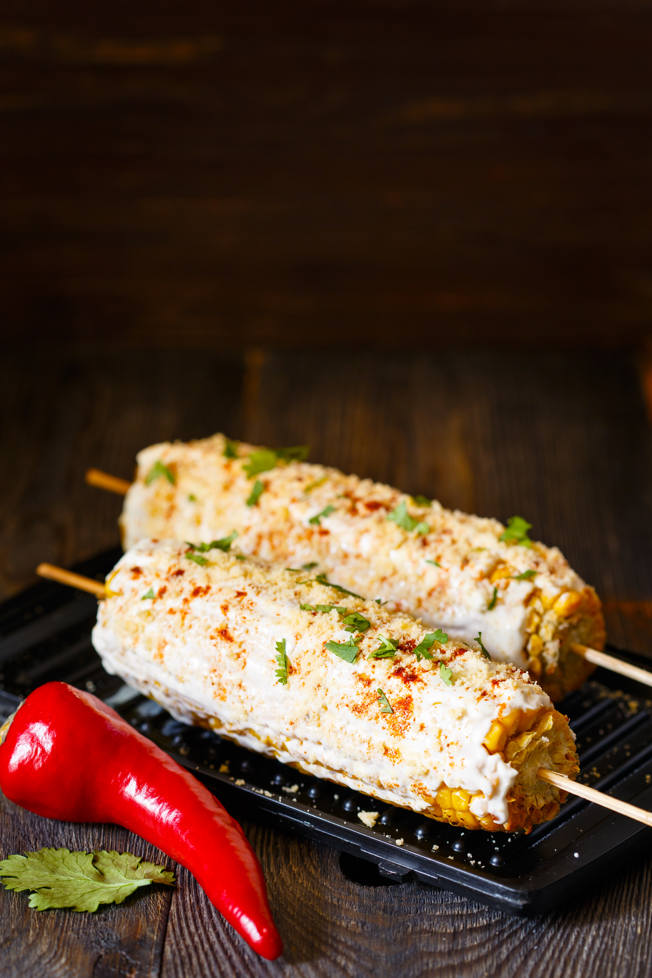 Elote is a popular Honduran food, which is corn on the cob with mayonnaise and sometimes cheese.