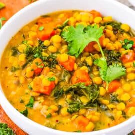 Easy sweet potato dahl served in a bowl, garnished with cilantro.