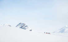 Snowshoeing-and-pulling-pulks-through-the-snow-capped-mountains