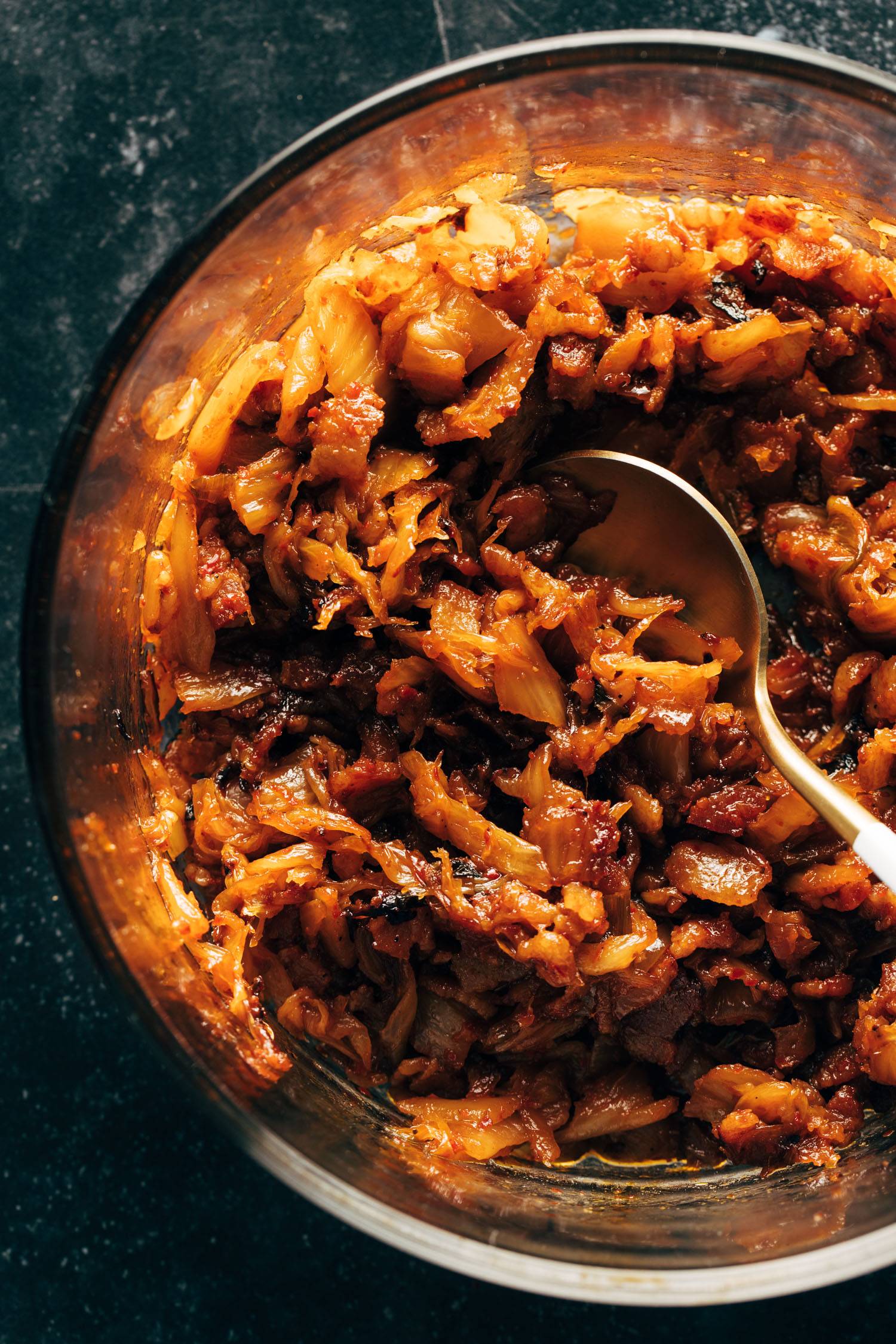 Caramelized kimchi and bacon in a pan