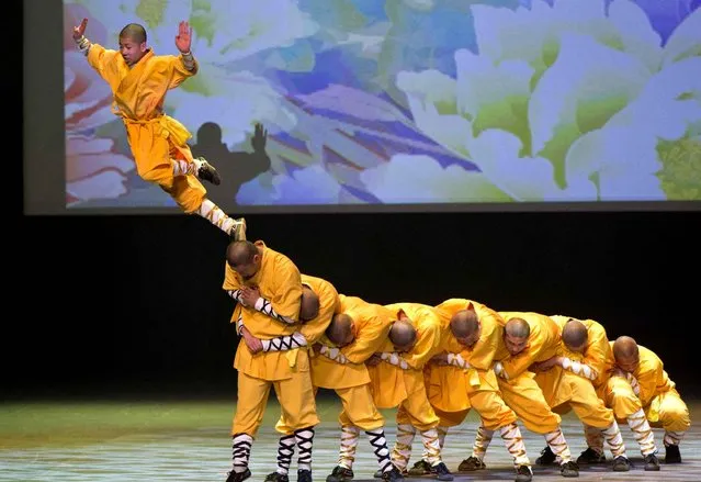 Members of Chinese Shaolin Temple Warrior Monks perform martial arts during the “Cultures of China, Festival of Spring” Gala in Toronto, Canada, on February 27, 2016. (Photo by Zou Zheng/Xinhua/Sipa USA)