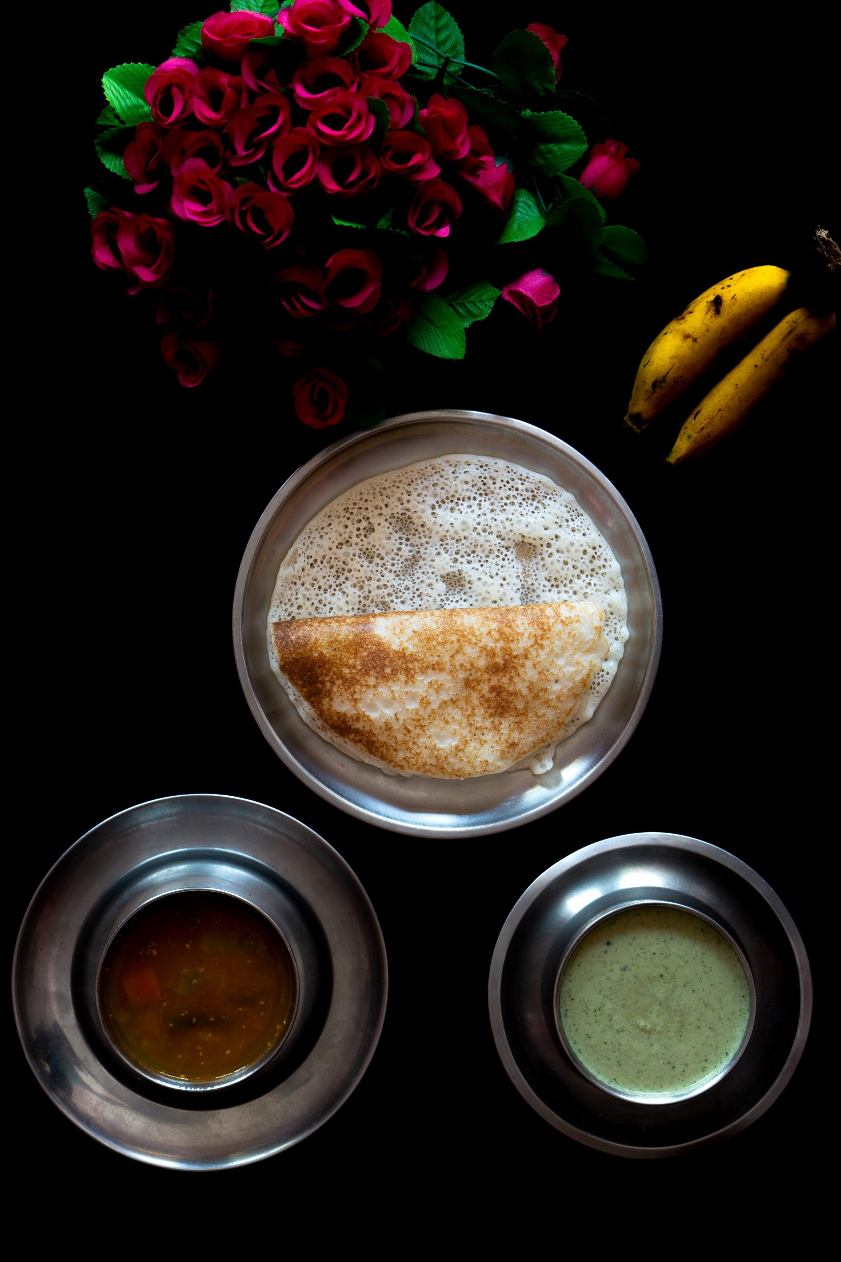 dosa with sambar, chutney and bananas