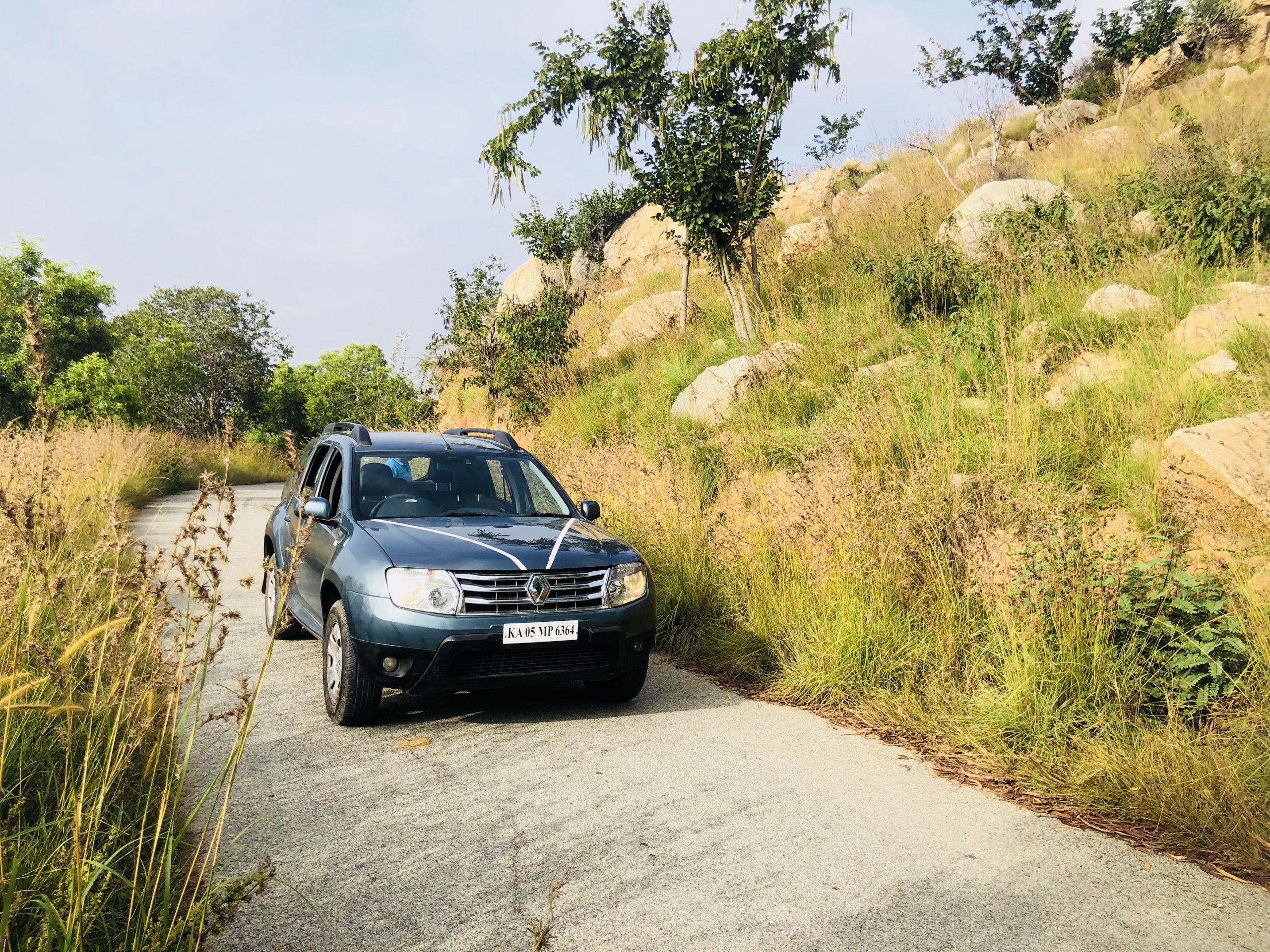 Renault Duster car on a dirt road