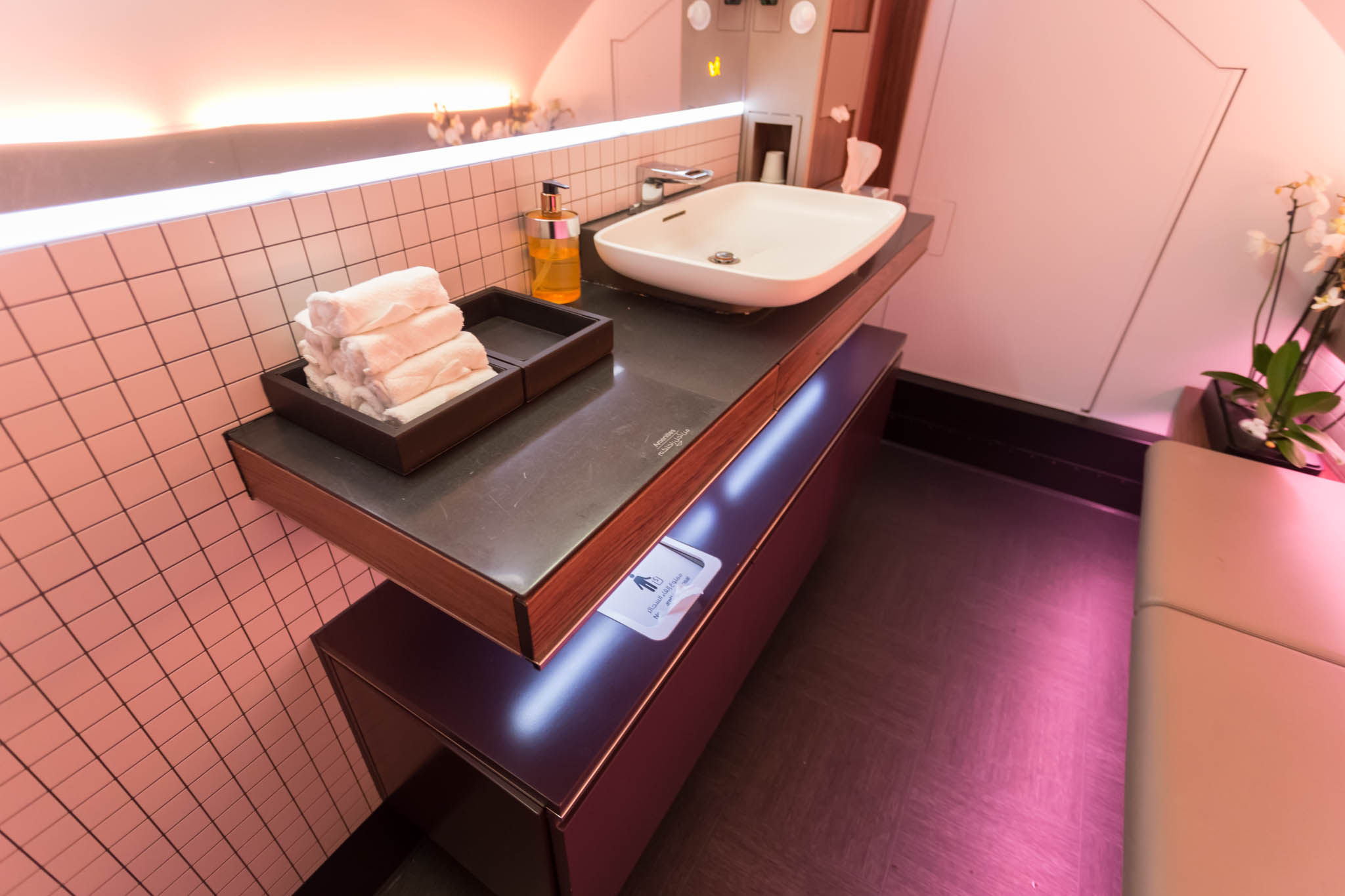 a sink and towels on a counter