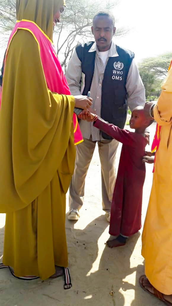 A nomad child is vaccinated against polio in Lower Juba, Somalia.