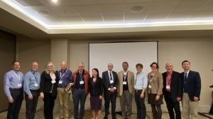 Shaw Symposium presenters gathered for a photo with Dr. Shaw.