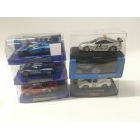 A collection of 6 Scalextric cars in original disp