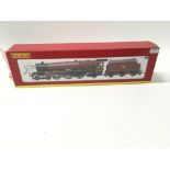 A boxed 00 gauge model locomotive with tender by H