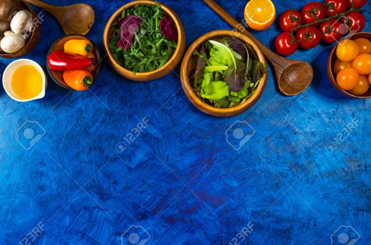 Organic Vegetables For Dietary Catering On Blue Background Stock Photo,  Picture And Royalty Free Image. Image 82407226.