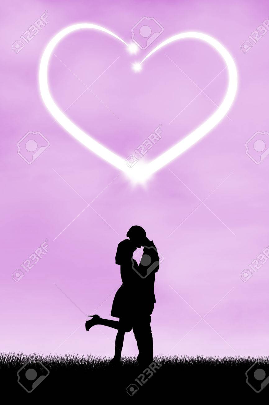 Silhouette Of Romantic Couple With Heart Symbol Of Love Stock ...