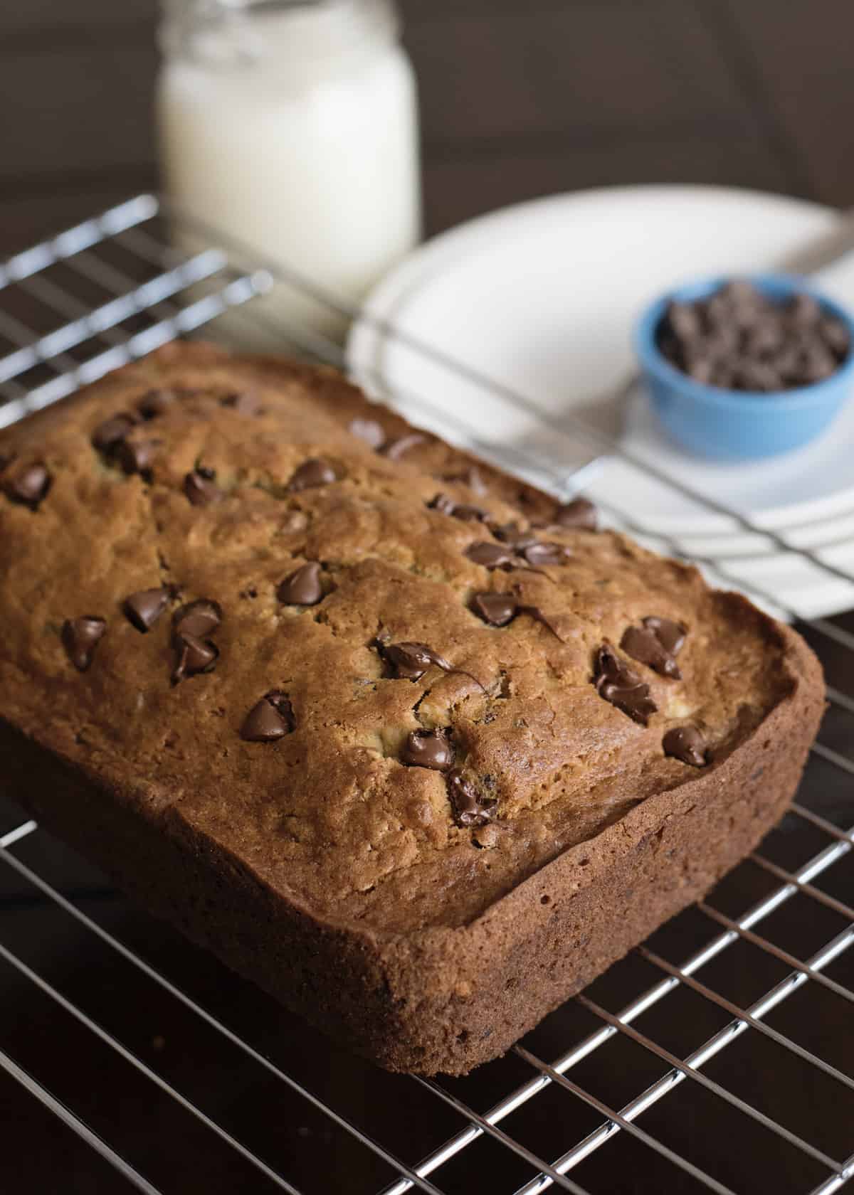 chocolate chip banana bread on iron rack