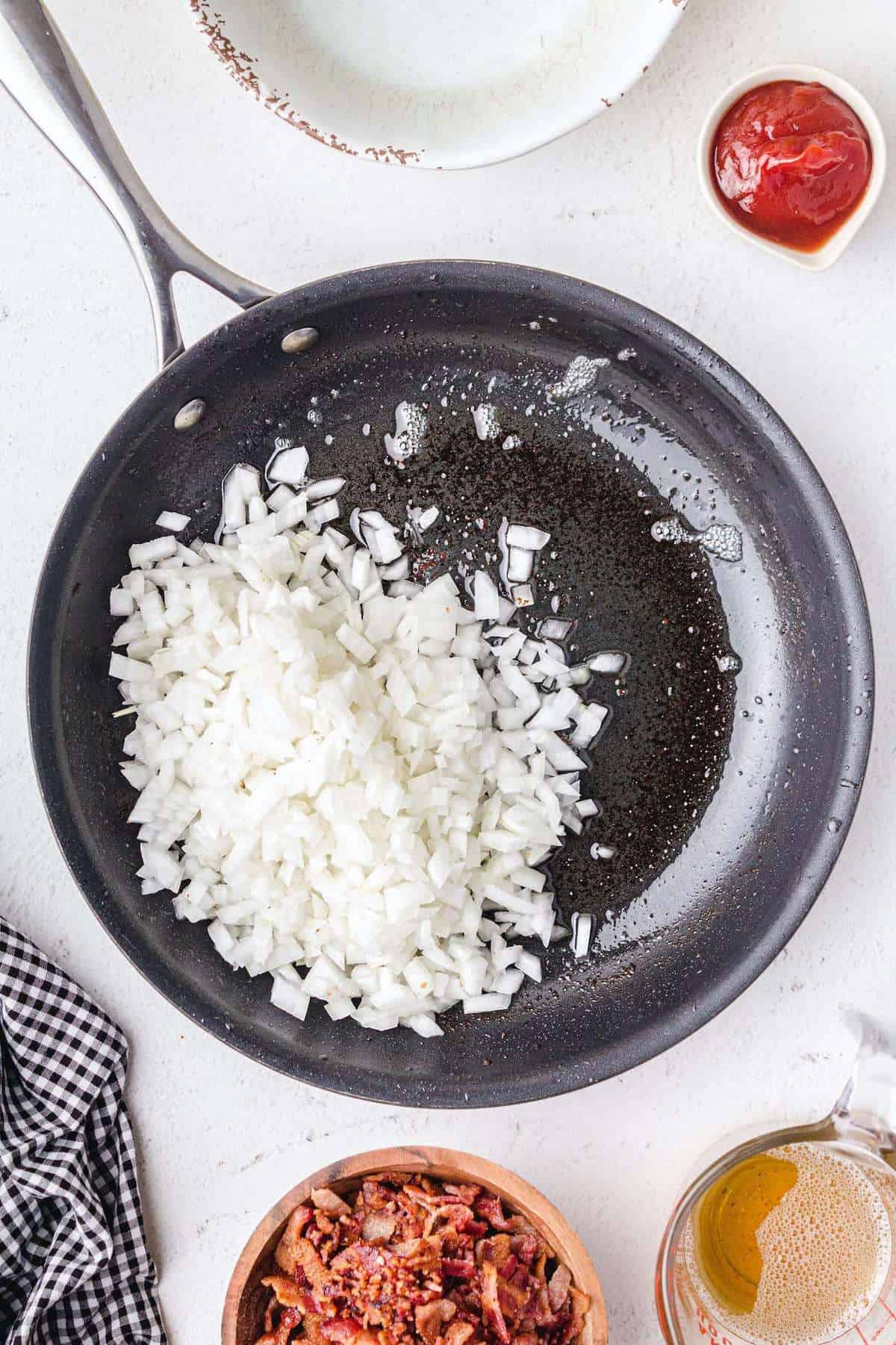 cooking onion in a frying pan