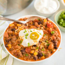 a bowl of taco soup on the table.