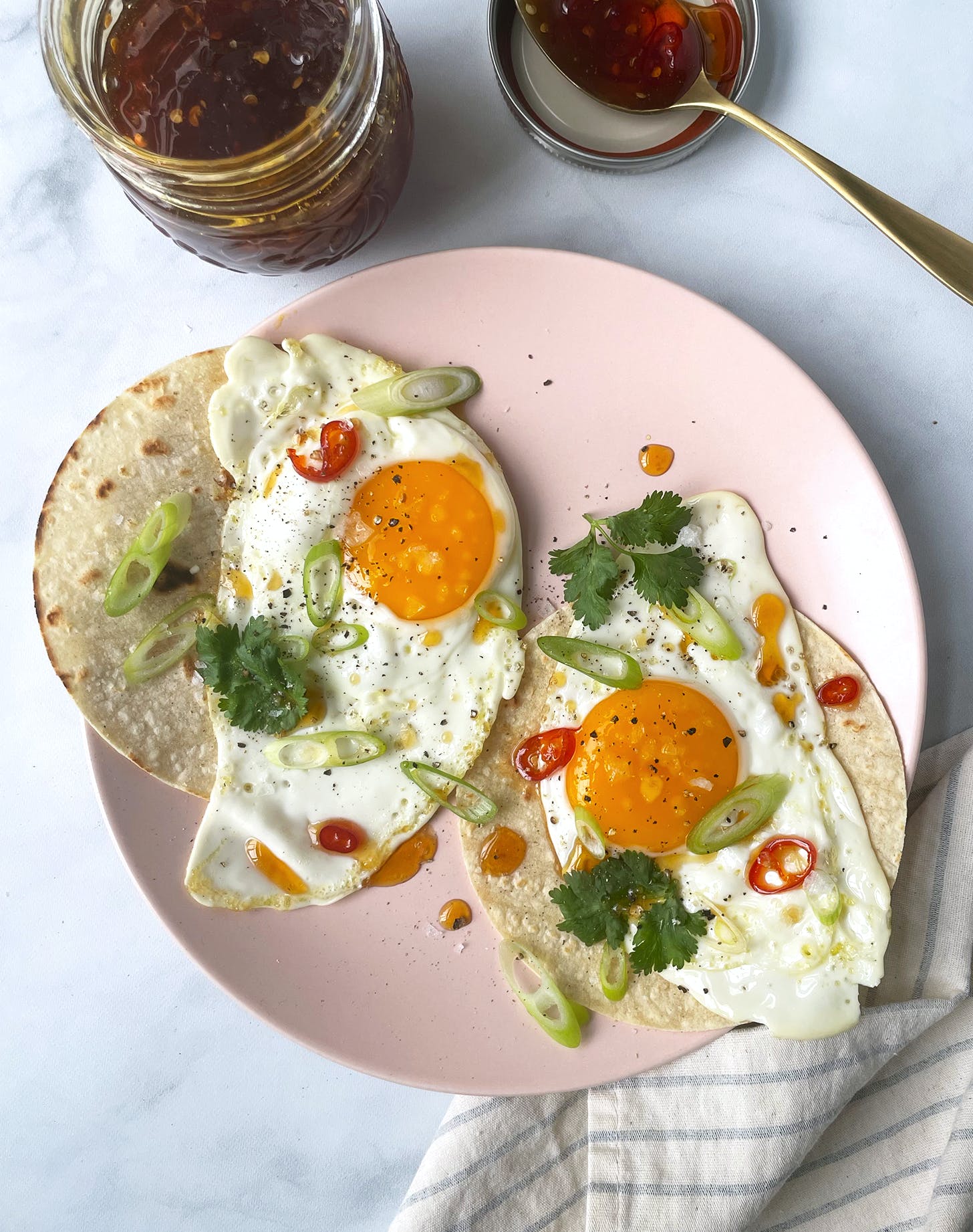 healthy egg breakfasts: fried egg breakfast tacos with hot honey