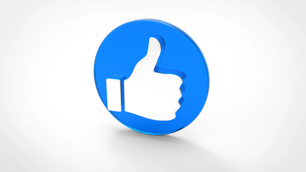 A blue 3D thumbs-up icon set inside a circular border, symbolizing approval or a "like," on a white background.